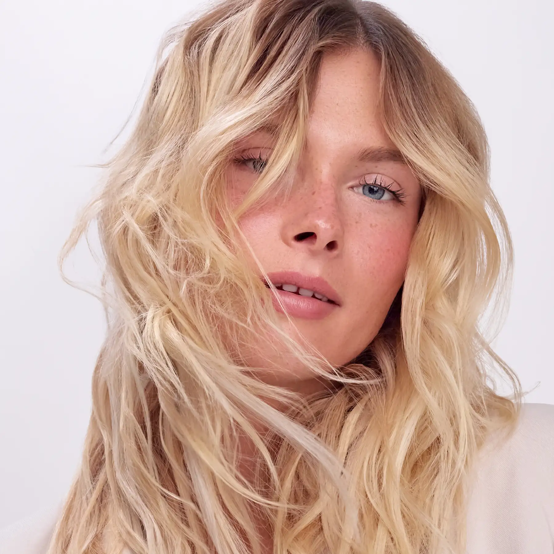 CPR Hair campaign portrait of a model with textured blonde waves