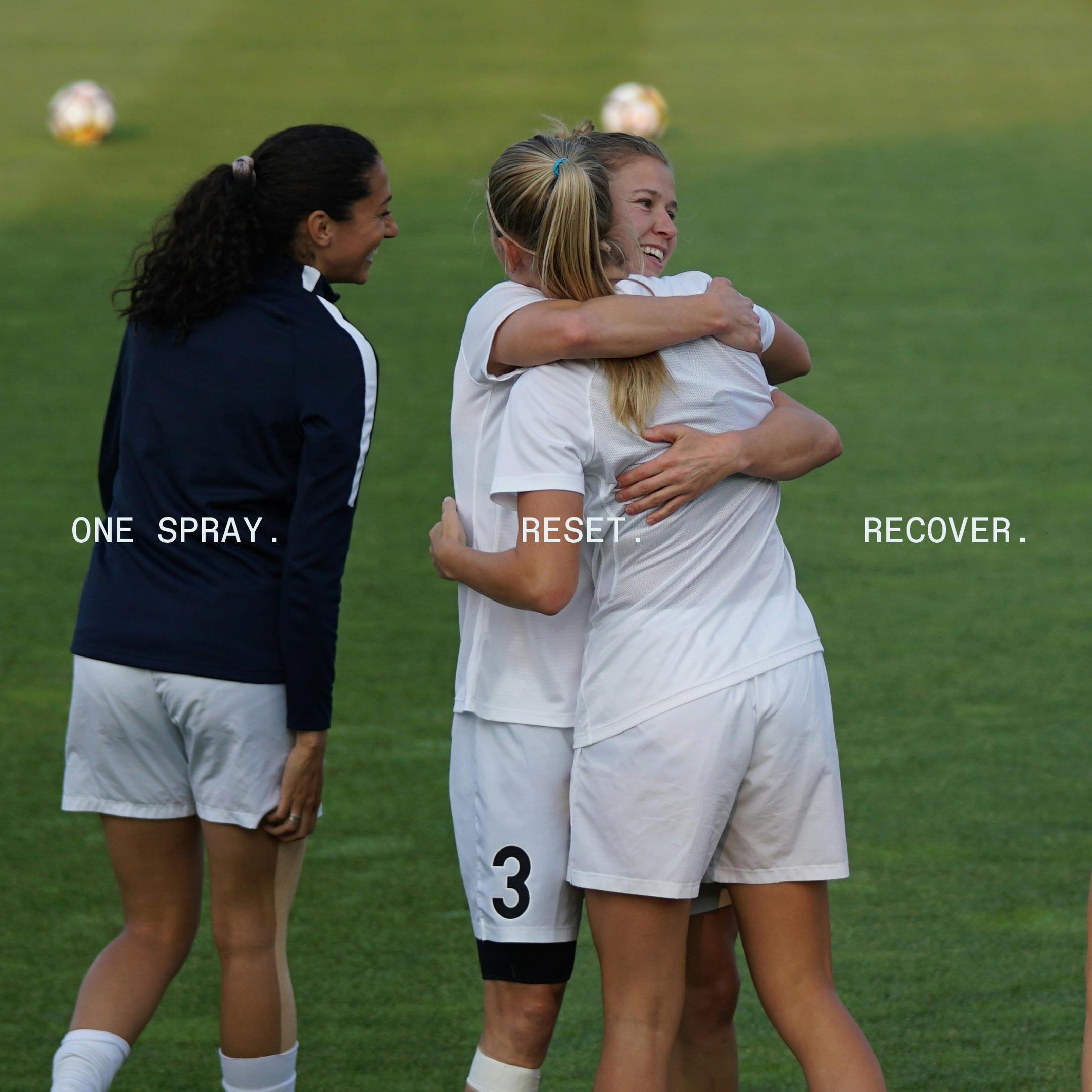 Noso campaign image of footballers embracing on the pitch