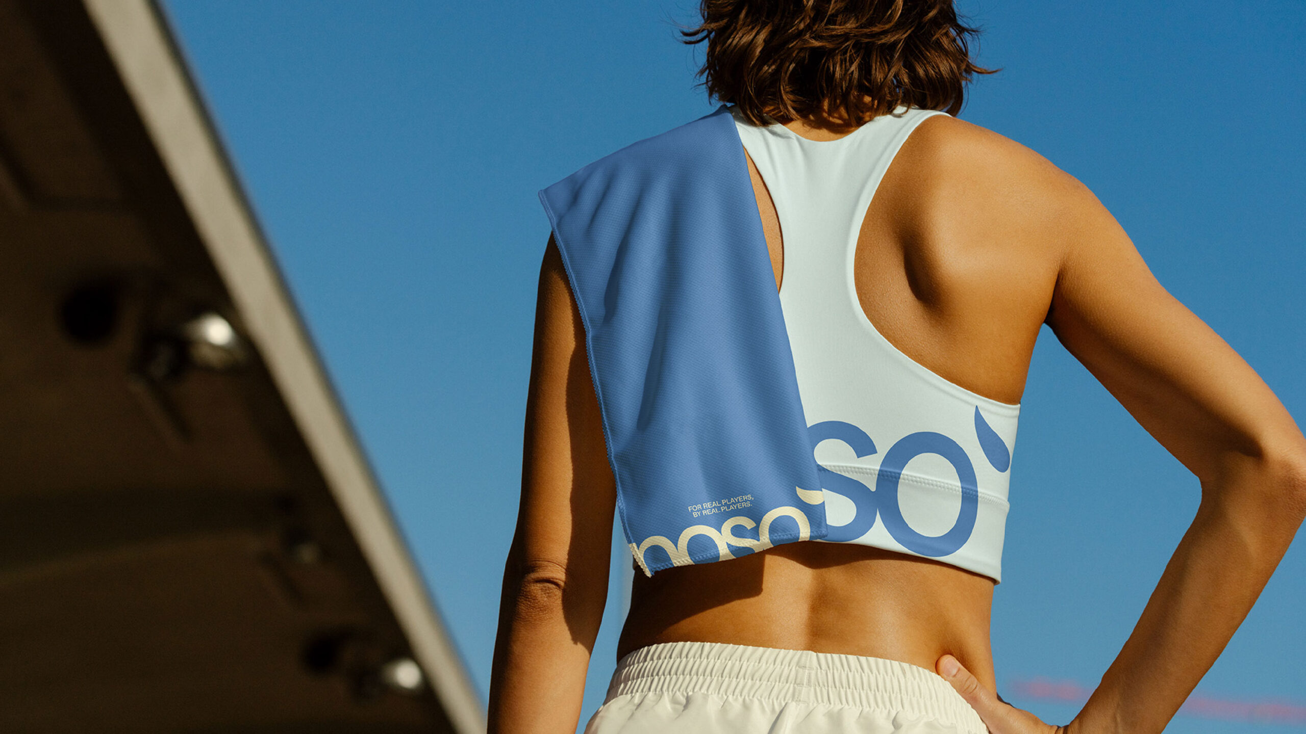 Noso activewear campaign image with branding across the back of a sports top