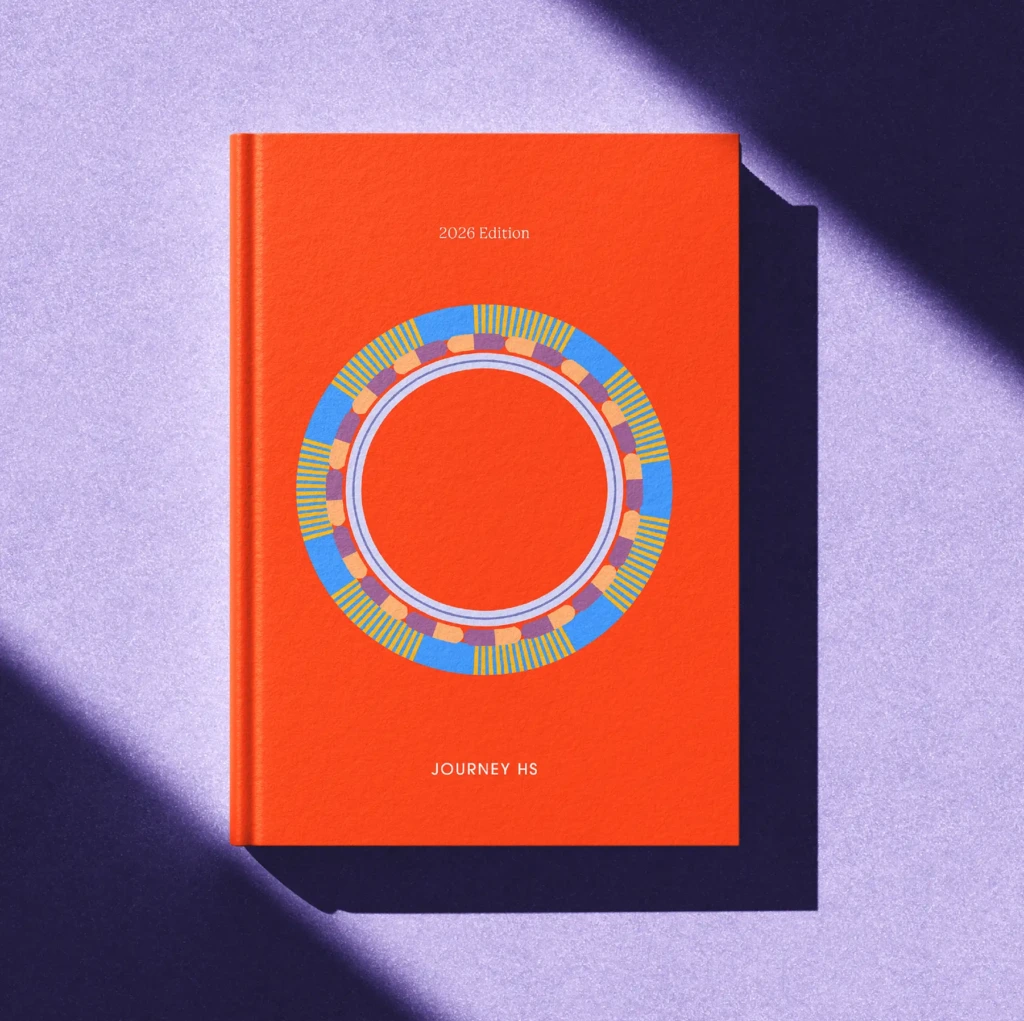 Journey HS annual edition report, hardback in orange with the radiating circle device