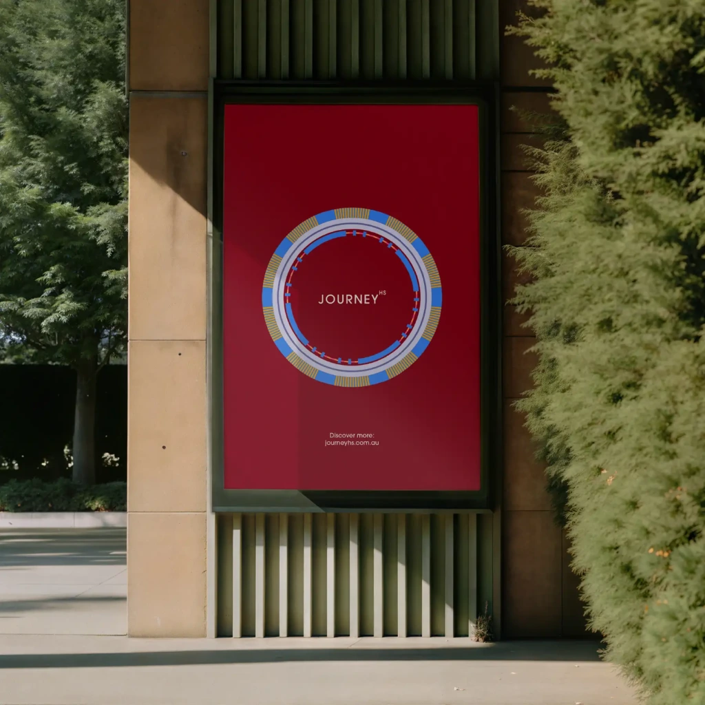 Journey HS poster in deep red with the radiating circle device, mounted on a stone wall